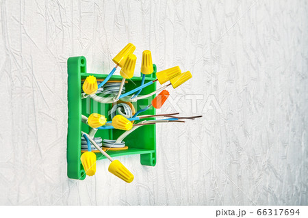 The connection of wires by twisting in home wiring 66317694