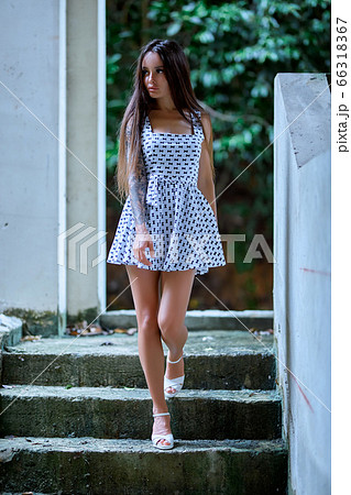 Young model walking on stairs in the ruined Young model walking on stairs in the ruined 66318367