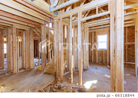 Wooden house frame structure on a new development 66318844