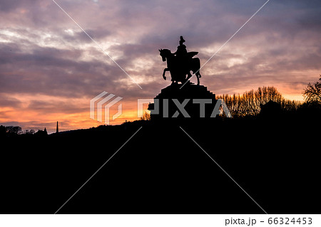 Colorful Sunrise burning sky Koblenz City historic monument German Corner where river rhine and mosele flow together 66324453