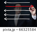 Businessman drawing arrows in different 66325584