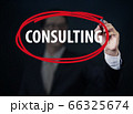 Businessman hand writing "Consulting" with red 66325674
