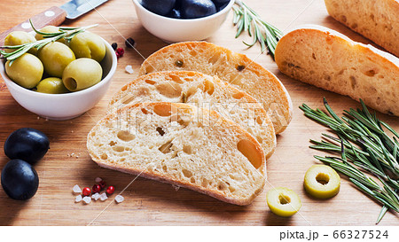 Italian ciabatta bread with olives and rosemary on Italian ciabatta bread with olives and rosemary on 66327524