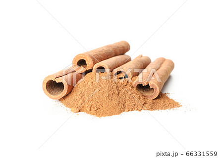 Cinnamon sticks and powder isolated on white Cinnamon sticks and powder isolated on white 66331559
