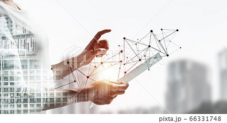 Businesswoman works with futuristic interface 66331748