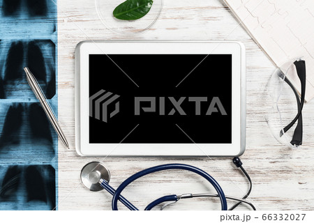 Mock up of doctors desktop with medical supplies Mock up of doctors desktop with medical supplies 66332027