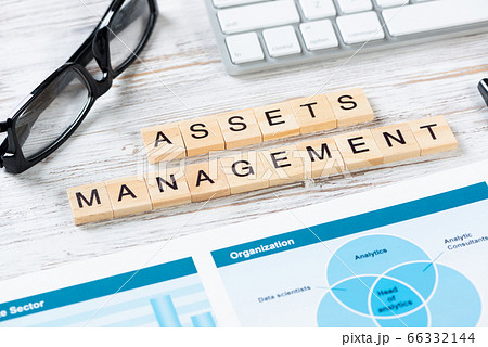 Asset management concept with letters on cubes 66332144