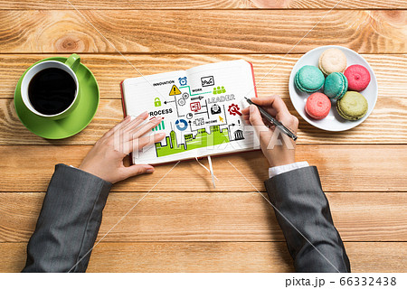 Businesswoman making business notes Businesswoman making business notes 66332438