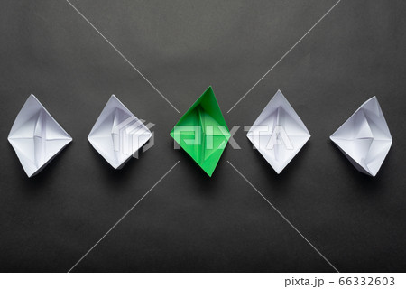 Row of paper ships on black background Row of paper ships on black background 66332603