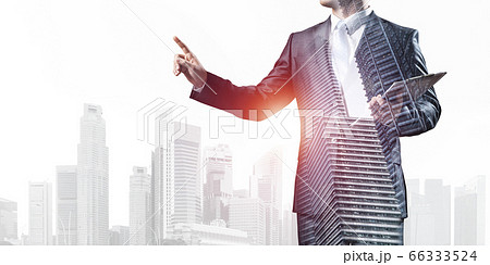 Businessman pointing on empty space 66333524