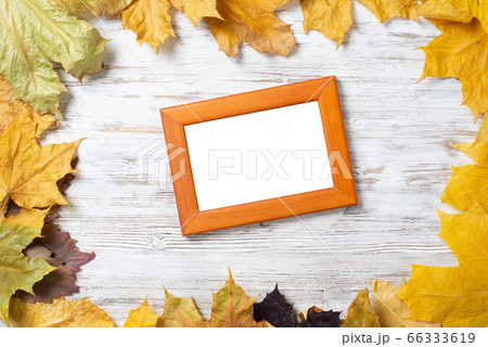 Blank rectangular photo frame on desk 66333619