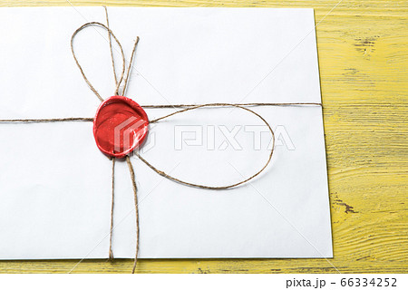 Letter with seal on table Letter with seal on table 66334252