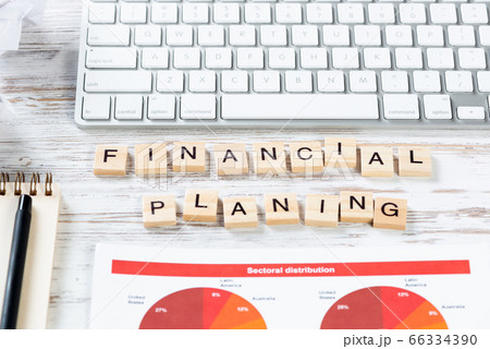 Financial planning concept with letters on cubes 66334390