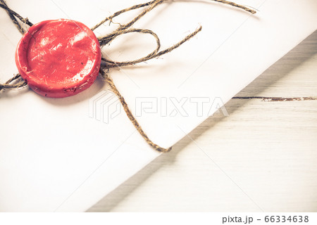 Letter with seal on table 66334638