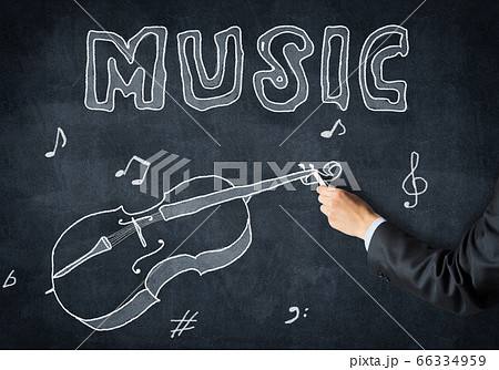 Businessman hand with chalk draws 66334959