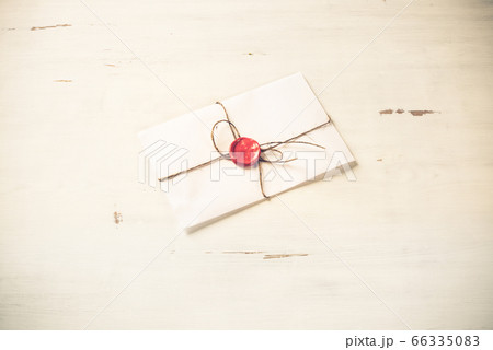 Letter with seal on table 66335083