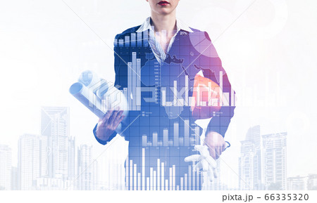 Woman architect with technical blueprints Woman architect with technical blueprints 66335320