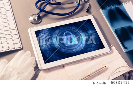 Web security and technology concept with tablet pc on table Web security and technology concept with tablet pc on table 66335415