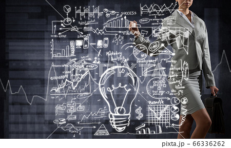 Woman sketching business ideas Woman sketching business ideas 66336262