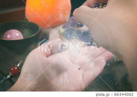 Palm reading with pendulum Palm reading with pendulum 66344002