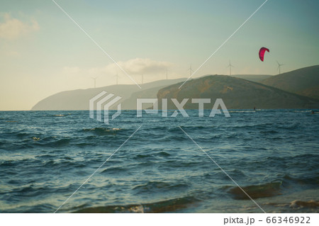Kitesurfer riding on the waves at Prasonisi kite beach at Rhodes island 66346922