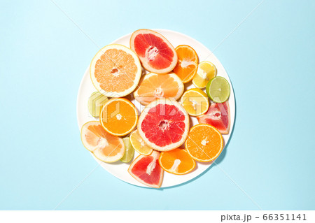 Plate with mix of citrus fruits. Plate with mix of citrus fruits. 66351141