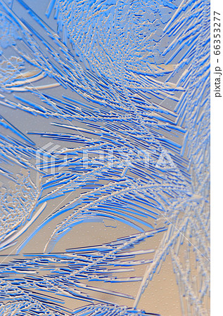 Natural pattern on glass at dawn of the sun. 66353277