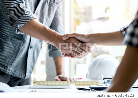 Finishing up a meeting, Two engineer or architect 66354522