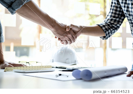 Finishing up a meeting, Two engineer or architect 66354523