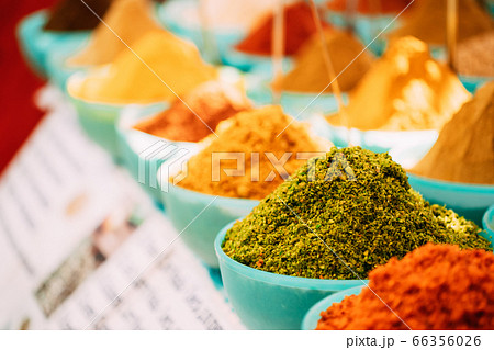 Close View Of Masala Curry, Bright Colors Fragrant Seasoning, Condiment In Tray On Local Food Market, Bazaar Close View Of Masala Curry, Bright Colors Fragrant Seasoning, Condiment In Tray On Local Food Market, Bazaar 66356026