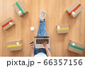 Top view of women working laptop computer from home with postal parcel, Ecommerce ideas concept 66357156