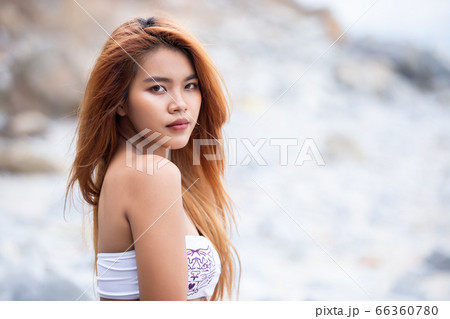 Beautiful young blond woman outdoors portrait. Beautiful young blond woman outdoors portrait. 66360780