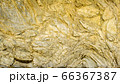 Texture of relief hard rock wall 66367387