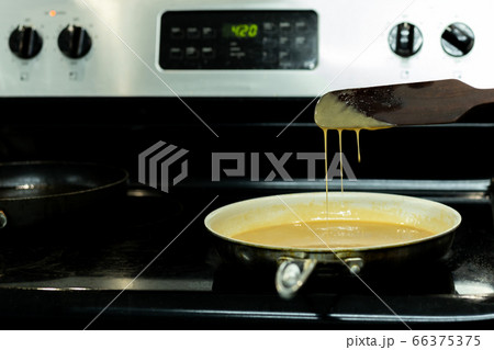 Homemade caramel cooking Process in frying pan. 66375375