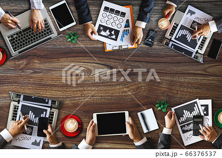 Business people in a stock market meeting. People corporate business team concept Business people in a stock market meeting. People corporate business team concept 66376537