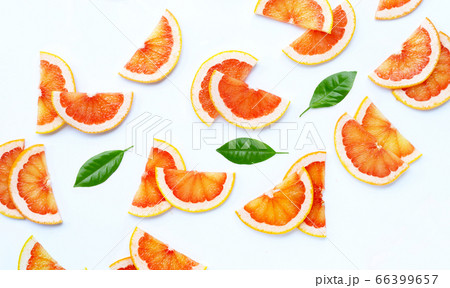 High vitamin C. Juicy grapefruit slices on white High vitamin C. Juicy grapefruit slices on white 66399657