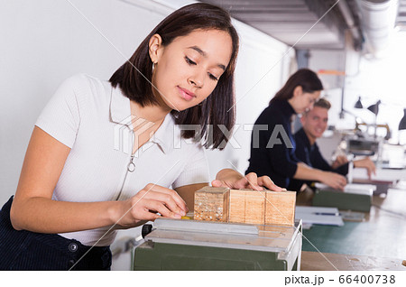 Girl working on architectural model Girl working on architectural model 66400738