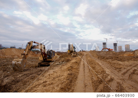 Group of the excavators for dig ground trenching 66403930
