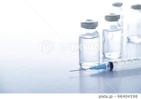 Studio shot of vials and syringe Studio shot of vials and syringe 66404598