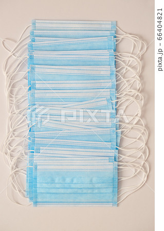 Studio shot of row of surgical masks Studio shot of row of surgical masks 66404821