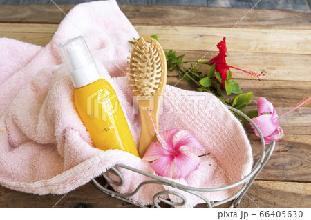 hair care serum for damaged hairs with comb health care beauty head and hairs with terry cloth in basket hair care serum for damaged hairs with comb health care beauty head and hairs with terry cloth in basket 66405630