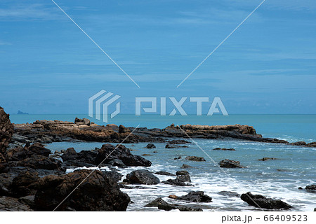 Wave crashing on the rocky reef Wave crashing on the rocky reef 66409523
