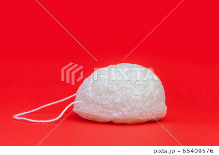 Natural Konjac Cleansing Sponge for face and body care on orange Natural Konjac Cleansing Sponge for face and body care on orange 66409576