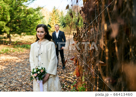 Young male and woman just married. Concept of Young male and woman just married. Concept of 66413460