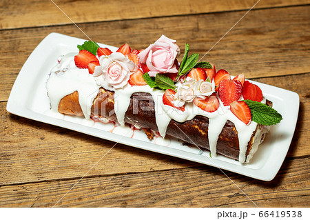 Swiss roll cake with fruit 66419538
