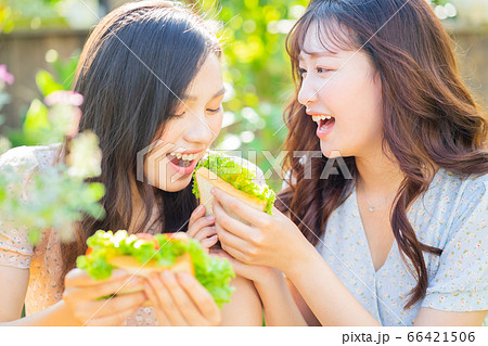 Women, eating, nature 66421506