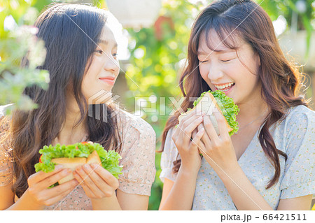 Women, eating, nature Women, eating, nature 66421511