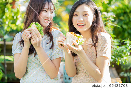 Women, eating, nature Women, eating, nature 66421708