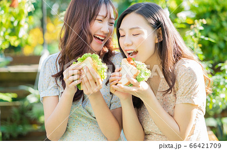 Women, eating, nature Women, eating, nature 66421709