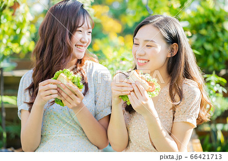 Women, eating, nature 66421713